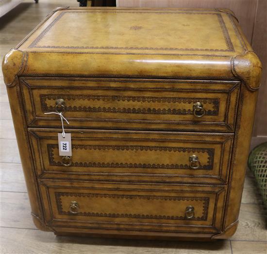 A leather bound chest of drawers, W.66cm
